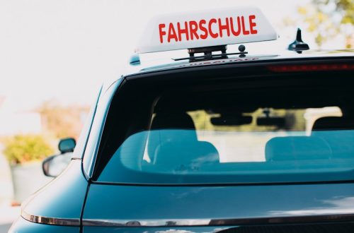 a close up of a car with a fahreschule sticker on it