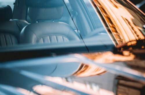 close-up photography of black vehicle during daytime
